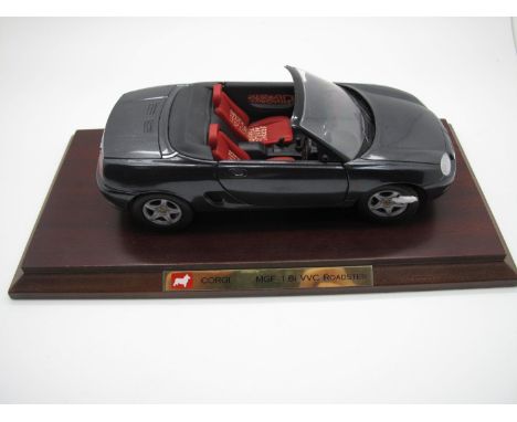 A Corgi 1:18th Scale Diecast Model #95105 MG MGF, boxed, complete with wooden display plinth.