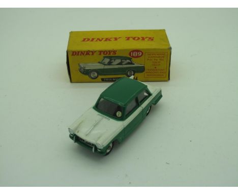 Dinky Toys No 189 Triumph Herald, green/white, overall good plus, chipping to raised edges, boxed, creasing, staining to box.