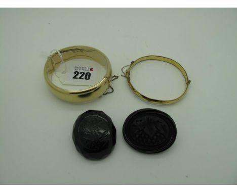 Two XIX Century Jet Brooches, each of oval form, one detailed with monogram initials (chips), a wide "1/20th 9ct Rolled Gold"