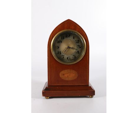 Edwardian mahogany and inlaid mantle clock with ecclesiastical style arch top and silvered dial, the backplate with snowflake