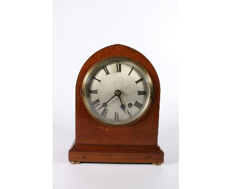 British mantle clock in ecclesiastical style arch top mahogany case, the backplate stamped 'EMPIRE 25656', 26cm tall.&nbsp; 