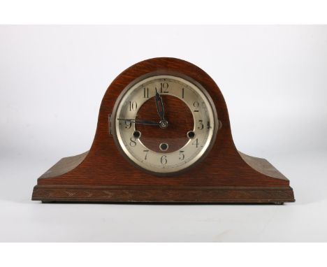 20th century oak cased Napoleon hat mantle clock chiming on five gongs, 41cm long.&nbsp; 
