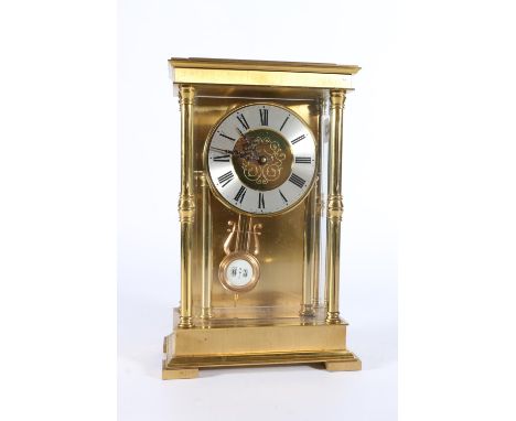 German brass cased mantle clock by Schmid, the backplate with 'SSS' mark, 26cm tall.&nbsp; 