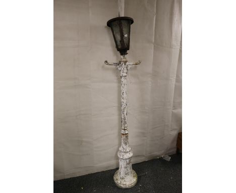Garden light in the form of a lamppost with metal lantern top, 210cm tall. 