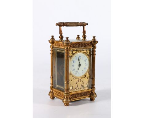 Late Victorian French carriage clock, the enamel dial with Arabic numerals framed by a relief plate depicting dragons, the wo