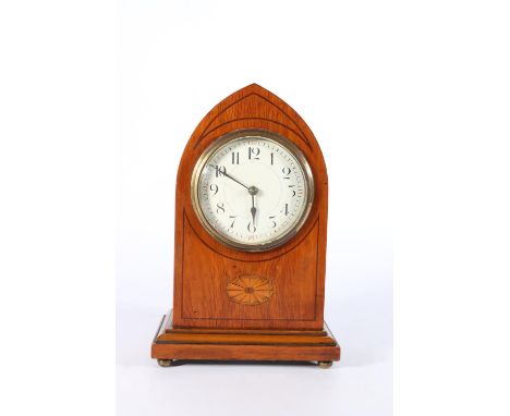 Edwardian mahogany and inlaid mantle clock with ecclesiastical style arch top, 23cm tall.&nbsp; 