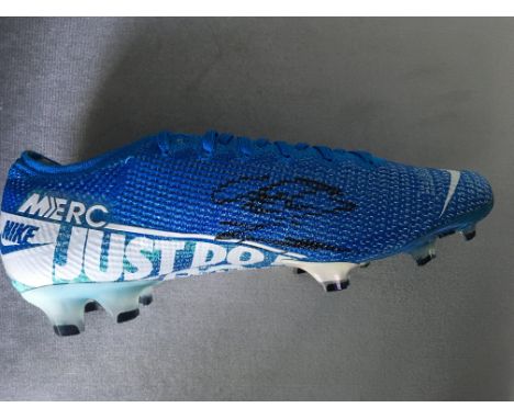 Eriksen Tottenham Signed Football Boot + Shirt: Given to vendor who organised a Nike promotional video in which Christian fea