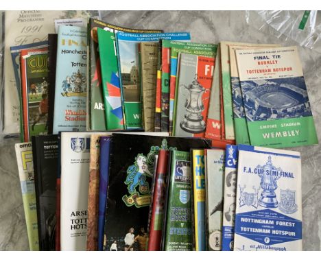 FA Cup Final + Semi Final Football Programmes: 31 finals from the 60s onwards plus 21 semi finals and 3 cup final brochures. 