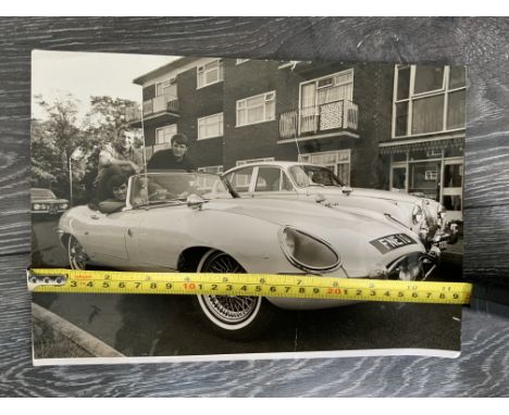 George Best Press Photo With Jaguar: Georgies love for the Jag is famous but we believe this is the first time this photo her