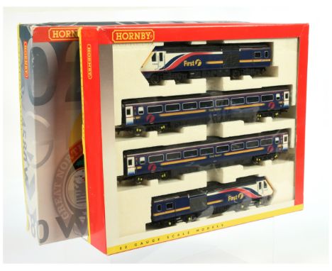 Hornby (China) R2299 "First Great Western Trains" 4-car HST Train Pack. Condition is Mint in Fair to Good Plus box.&nbsp;