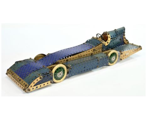 Meccano Pre-War model of a Bluebird Car in blue and gold parts. Condition is Poor.&nbsp;