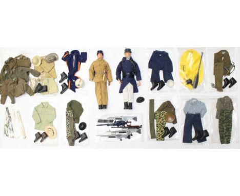 Action Man: A pair of dressed Action Man figures, together with a collection of assorted accessories and clothing related. Go