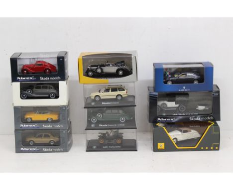 Diecast: A collection of eleven boxed diecast vehicles, to include: Skoda, Renault, Audi and Maserati. Original boxes, genera