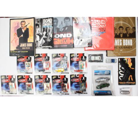 James Bond: A collection of nine carded James Bond 007 vehicles, together with a collection of assorted books to include: Bon