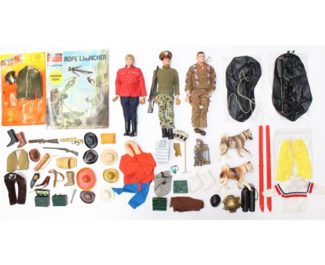 Action Man: A collection of three dressed Action Man figures, together with a collection of assorted accessories and clothing