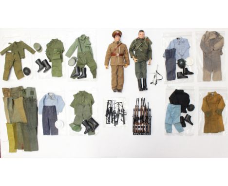 Action Man: A pair of dressed Action Man figures, together with a collection of assorted accessories and clothing related. Go