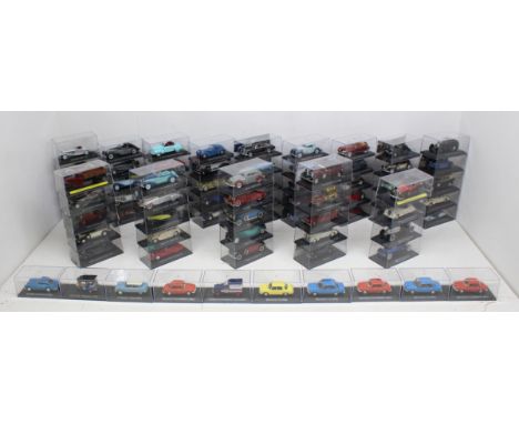 Diecast: A collection of over 50 cased diecast vehicles, most likely magazine issue. Original cases, general wear expected wi