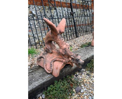 A large cast terracotta dragon ridge tile 