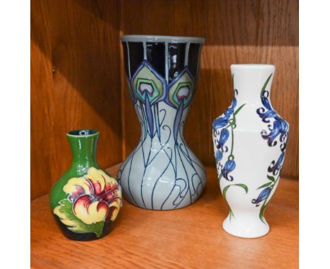 A Moorcroft grey-ground vase, painted with stylised flowers in the Art Nouveau manner (2012), 18 cm high to/w a white-ground 