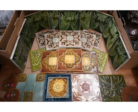 Nine Art Nouveau green majolica 6" ceramic tiles decorated with stylised flowers, to/w 15 other tiles (box) 
