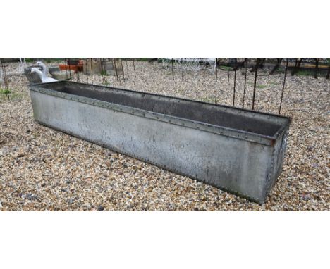 Large galvanized rivetted trough, 244 x 48 x 42 cm h 