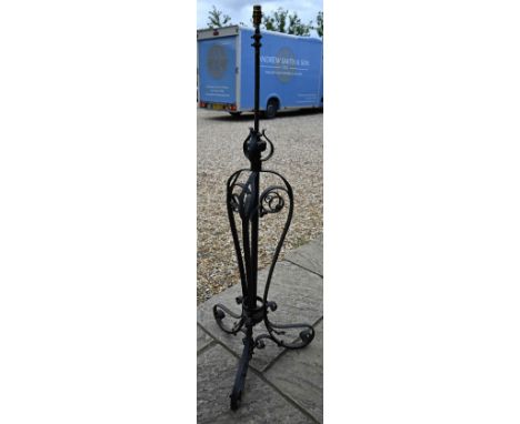 A wrought iron telescopic standard lamp in the Art Nouveau style, 143 cm high 