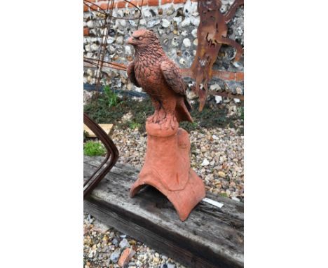 A cast terracotta hawk ridge tile 