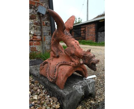 A large cast terracotta dragon ridge tile (chipped) 