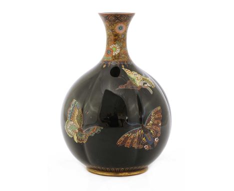 A Japanese cloisonné vase,Meiji period (1868-1912), of lobed globular form, enamelled with butterflies against a black ground