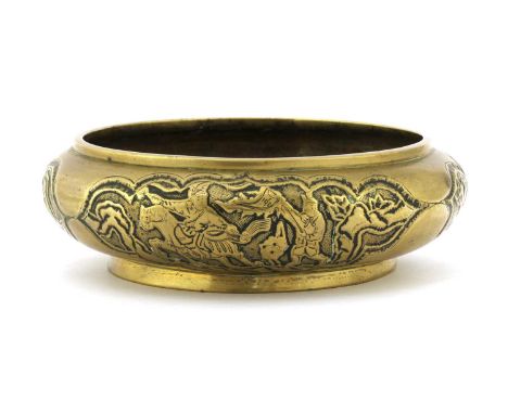 A Chinese bronze incense burner, early 20th century, of compressed globular form on a flared circular foot, decorated with fi