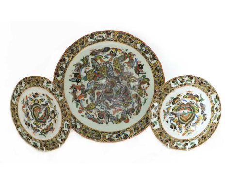 A Chinese porcelain charger, early 20th century, of circular form, painted with butterflies, 41cm diameter, and two plates, s