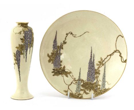 A Japanese Satsuma ware plate, Meiji period (1868-1912), by Yabu Meizan (1853-1934), of circular form, painted with blossomin