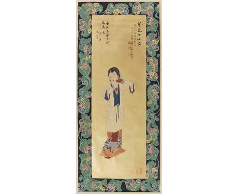 A Chinese hanging scroll,of a lady putting a flower in her hair, inscribed with dedications and signature of Zhang Daqian wit