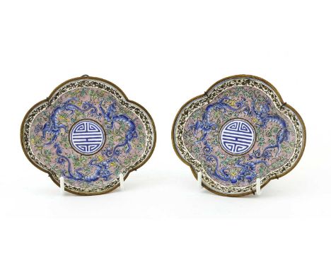 A pair of Chinese export Canton painted enamel saucers,18th century, of quatrefoil form, painted with chilong surrounding a s