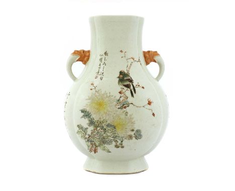 A Chinese qianjiang vase, Republic period (1912-1949), of compressed lobed pear form, flanked by mask and tongue handles, the