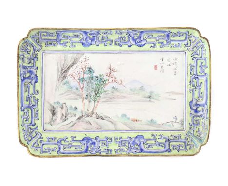 A Chinese Canton painted enamel tray, late 18th century, of shaped rectangular form on four feet, painted with pine trees bes