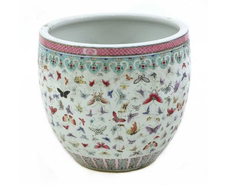 A Chinese famille rose fishbowl, 19th century, of ovoid form with inverted rim, painted with numerous butterflies, between ru