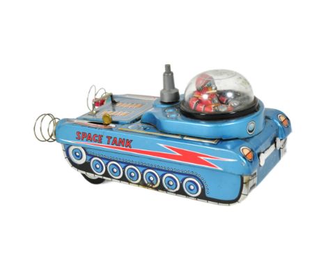 A vintage Japanese ' Masudaya ' ( Modern Toys ) made tinplate battery operated Space Tank. Litho printed with Space Man figur