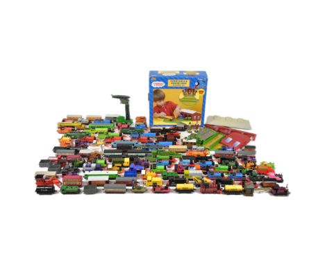 Model Railway - a large collection of ERTL made diecast model railway locomotives, rolling stock, trackside pieces and a boxe
