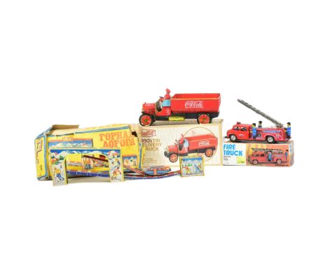 Tinplate Toys - a collection of vintage tinplate clockwork / mechanical toys comprising a Russian made ski lift, Fire Truck w