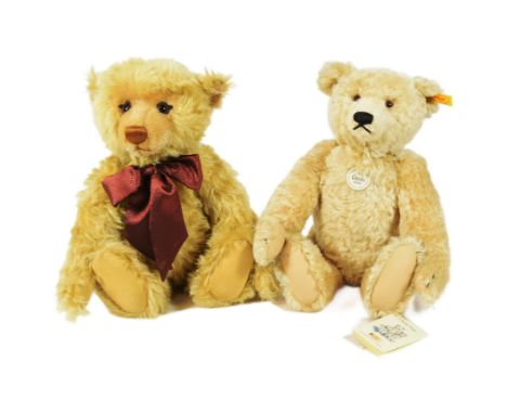 Teddy Bears - x2 original German Steiff made soft toy teddy bears with growlers comprising 670374 and 000683. Each with golde