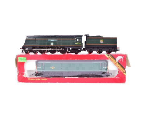 Two vintage Hornby OO gauge model railway trainset locomotive diesel engines, comprising of: No. R074-BB Class 7P 'Battle of 