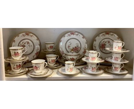 A Royal Doulton Canton pattern tea and dinner service , for six,  comprising dinner plates, side plates, coffee cups and sauc