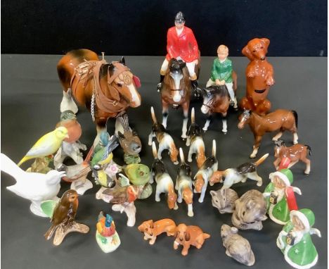 A pair of Goebel candlesticks, others Beswick, Royal Doulton, Crown Staffordshire etc inc birds, dogs;  Poole field mice;  hu