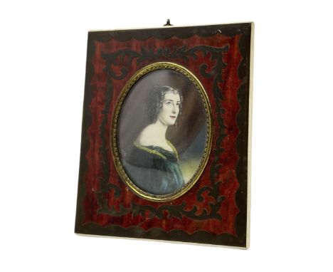 Miniature oval half length portrait of a lady in Boulle type frame, signed 8cm x 6.5cm