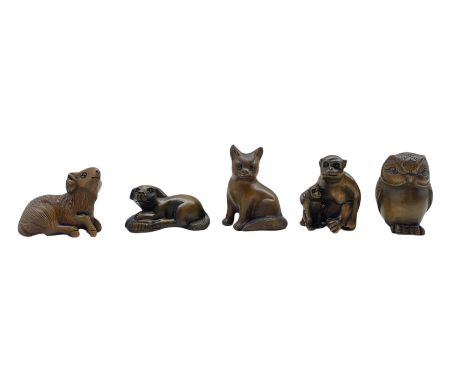 Five netsuke, modelled as a ram, owl, dog, cat and monkey with child