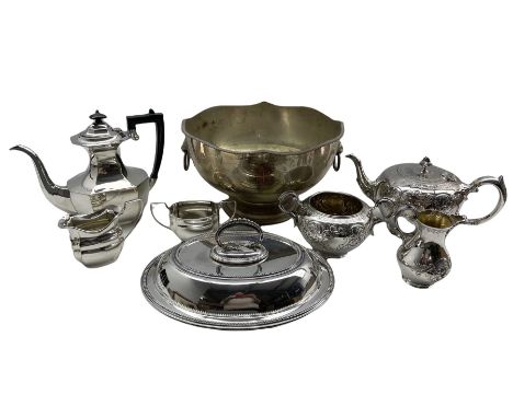 Silver-plated footed punch bowl with twin lion mask and ring handles, Walker &amp; Hall entree dish with beaded borders, thre