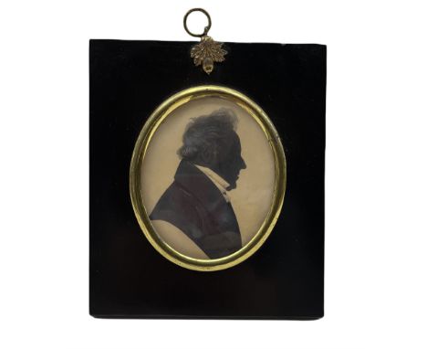 19th century oval silhouette portrait of a gentleman with highlights 9cm x 8cm in ebonised frame