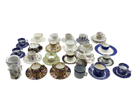 Collection of 19th and 20th century porcelain cabinet coffee cups and saucers including three Copeland blue and white Willow 