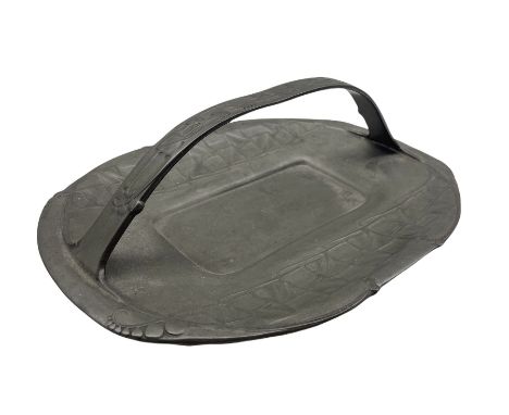 Archibald Knox for Liberty &amp; Co - Arts and Crafts pewter cake basket with stylised flowers and loop handle, impressed mar